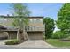 Charming townhouse with covered parking, a balcony, and well-maintained landscaping at 2020 Jardin Ct, Alpharetta, GA 30022