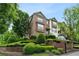 Beautiful brick townhome with manicured landscaping and an inviting entrance at 2020 Jardin Ct, Alpharetta, GA 30022