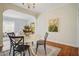 Charming dining room with hardwood floors and views into another room at 615 Sycamore Dr, Decatur, GA 30030
