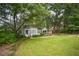 Charming home featuring a lush front lawn, inviting porch, and a picturesque curb appeal at 615 Sycamore Dr, Decatur, GA 30030