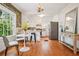 Bright kitchen with stainless steel appliances, patterned wallpaper, and breakfast nook at 615 Sycamore Dr, Decatur, GA 30030