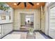 Covered patio offering seating with view of the dining room at 615 Sycamore Dr, Decatur, GA 30030