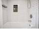 Clean white subway tile shower and tub at 615 Sycamore Dr, Decatur, GA 30030