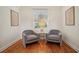 Cozy sitting room with hardwood floors, neutral decor, and natural light at 615 Sycamore Dr, Decatur, GA 30030