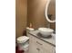 Bathroom with a granite countertop, unique vessel sink, and matching mirror at 7324 Bridlewood Ct, Jonesboro, GA 30236