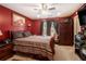 Comfortable bedroom with a ceiling fan and natural light at 7324 Bridlewood Ct, Jonesboro, GA 30236