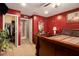 Serene bedroom with a dresser and access to a walk-in closet at 7324 Bridlewood Ct, Jonesboro, GA 30236