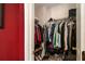 Walk-in closet with organized shelving and ample storage space at 7324 Bridlewood Ct, Jonesboro, GA 30236