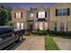 Charming townhome with beautiful curb appeal, manicured lawn, and inviting entrance, close to the neighborhood at 7324 Bridlewood Ct, Jonesboro, GA 30236