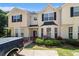 Charming townhome with curb appeal, featuring lovely landscaping, a well-manicured lawn and ample parking at 7324 Bridlewood Ct, Jonesboro, GA 30236