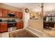 Well-equipped kitchen with stainless steel appliances and convenient access to dining area at 7324 Bridlewood Ct, Jonesboro, GA 30236
