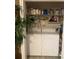 Functional laundry room with washer, dryer, shelving and storage at 7324 Bridlewood Ct, Jonesboro, GA 30236
