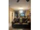Living room with a view of the kitchen, showcasing an open floor plan at 7324 Bridlewood Ct, Jonesboro, GA 30236