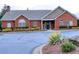 Charming brick clubhouse with well-maintained landscaping and inviting entrance at 106 Vintage Club Cir, Marietta, GA 30066
