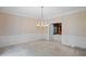 Formal dining room with classic detailing and a view to another room at 1440 Northwold Dr, Atlanta, GA 30350