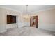 Elegant dining room featuring classic details and views into other areas of the home at 1440 Northwold Dr, Atlanta, GA 30350