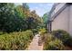 Beautifully landscaped yard with a winding walkway leading to the home at 1440 Northwold Dr, Atlanta, GA 30350