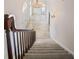 Grand marble tiled foyer with a staircase and ornate chandelier at 1440 Northwold Dr, Atlanta, GA 30350