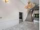 Spacious foyer with marble floors, white walls, and a stunning chandelier at 1440 Northwold Dr, Atlanta, GA 30350