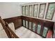 Spacious living room with wood paneled walls and large windows at 1440 Northwold Dr, Atlanta, GA 30350