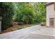 View of the outdoor patio and backyard area, perfect for relaxing and entertaining guests in a private, wooded setting at 1440 Northwold Dr, Atlanta, GA 30350