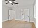 Open bedroom features doorways to the bathroom and hallway, enhancing the airy and bright feel at 1576 Hawthorne Se Ave, Smyrna, GA 30080
