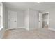 Unfinished bedroom space with two entry doors ready to be transformed into a cozy retreat at 1576 Hawthorne Se Ave, Smyrna, GA 30080