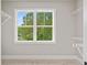 Bright closet space with a large window and views of surrounding greenery at 1576 Hawthorne Se Ave, Smyrna, GA 30080