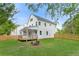 The house features a wooden deck, a fenced yard, and is nestled among mature trees for added privacy at 1576 Hawthorne Se Ave, Smyrna, GA 30080
