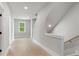 Upstairs hallway with hardwood floors and lots of natural light at 1576 Hawthorne Se Ave, Smyrna, GA 30080