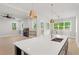 Spacious open concept kitchen with island, stainless appliances, white cabinets, hardwood floors and lots of natural light at 1576 Hawthorne Se Ave, Smyrna, GA 30080