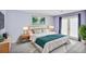 Serene bedroom featuring soft colors, a plush bed, and access to a private balcony at 59 Saint Claire Ne Ln, Atlanta, GA 30324