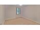 Cozy bedroom with neutral carpet and window at 59 Saint Claire Ne Ln, Atlanta, GA 30324