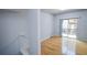 Dining area with hardwood floors, a patio door, and views of outdoor living at 2201 Landing Walk Dr, Duluth, GA 30097