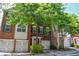 Brick townhome with well-maintained landscaping, charming shutters, and a convenient one-car garage at 2201 Landing Walk Dr, Duluth, GA 30097