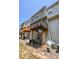 Exterior shot of townhouse showing multiple decks and yard at 2201 Landing Walk Dr, Duluth, GA 30097