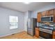 Kitchen with stainless steel appliances, tile backsplash and wood cabinets at 2201 Landing Walk Dr, Duluth, GA 30097