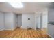 Living room with hardwood floors, modern lighting, and a TV mount ready at 2201 Landing Walk Dr, Duluth, GA 30097