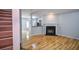 Warm and inviting living room featuring hardwood flooring and a cozy fireplace at 2201 Landing Walk Dr, Duluth, GA 30097
