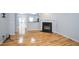 Elegant living room features hardwood floors, fireplace, and open layout, perfect for entertaining and relaxation at 2201 Landing Walk Dr, Duluth, GA 30097