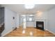 Spacious living room featuring beautiful hardwood floors and a cozy fireplace at 2201 Landing Walk Dr, Duluth, GA 30097