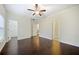 Bedroom featuring hardwood floors, a ceiling fan and an ensuite bathroom at 3231 Chutney Ct, Avondale Estates, GA 30002