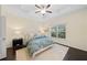 Tranquil main bedroom with tray ceiling, ceiling fan, and a large window; a serene retreat at 3231 Chutney Ct, Avondale Estates, GA 30002