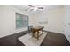 Bright office featuring hardwood floors, a ceiling fan, a modern desk, and natural light at 3231 Chutney Ct, Avondale Estates, GA 30002