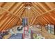 Spacious attic with exposed wood beams, perfect for storage or conversion at 4985 Miller Sw Rd, Lilburn, GA 30047