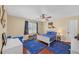Cozy bedroom with blue accents, featuring a bed, desk and toy storage at 4985 Miller Sw Rd, Lilburn, GA 30047