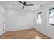 Bedroom with hardwood floors, ceiling fan, and two windows at 88 Cleveland Unit B Se St, Atlanta, GA 30316