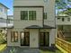 Rear exterior of the home showcasing double doors and a fenced-in yard at 88 Cleveland Unit B Se St, Atlanta, GA 30316