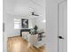 A bright home office features a desk, two chairs, and a pelican artwork at 88 Cleveland Unit B Se St, Atlanta, GA 30316