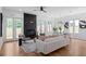 Cozy living room with a striking fireplace, hardwood flooring, and comfortable seating at 88 Cleveland Unit B Se St, Atlanta, GA 30316